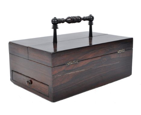 An early 18th century Regency period rosewood portable travelling foldout writing box. The caddy having a turned single handl