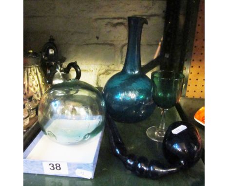 A 19th Century blue glass flask, blue glass pipe and other glass