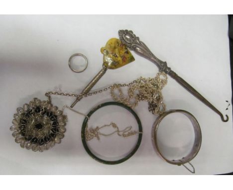 A silver bangle, enamel ring and bangle, two chains (a/f), brooch and heart pendant, pencil and buttonhook