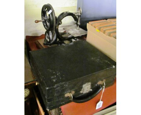 A Wilcox &amp; Gibbs sewing machine and vintage Corona typewriter