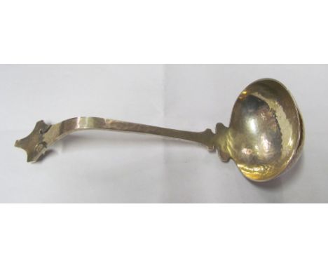 A Shreve &amp; Co. Sterling silver Arts &amp; Crafts beaten silver ladle