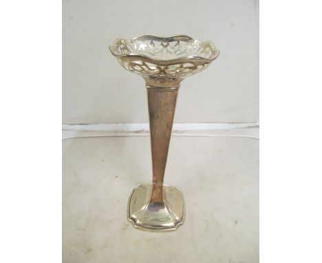 A silver vase with pierced shape edge and a silver Challenge cup