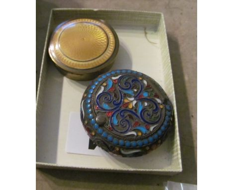 A brass box with yellow enamel lid and a champleve enamel box