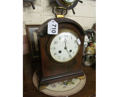 An Edwardian mahogany and satinwood string bracket clock