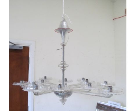 An Art Deco long stem ceiling light with twelve glass branches and circular glass sconces