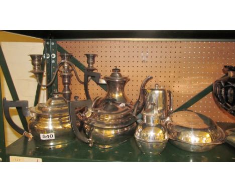 A plated teapot, coffee pot and other plated items