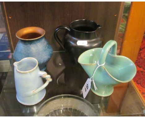 A Dicker Pottery black jug, green basket, blue vase and small jug with twisted handle