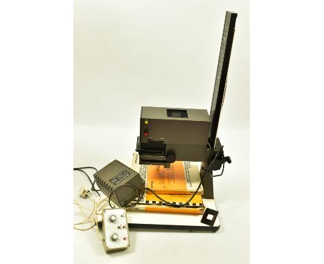 A DURST M605 COLOUR ENLARGER with a boxed 1081 Multi Exposure Easel, a Cofram 243 Masking Frame, power supply and timer