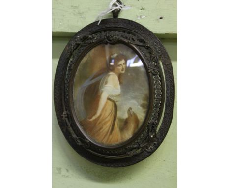 AN EDWARDIAN PORTRAIT MINIATURE, possibly on ivory, depicting a maiden in flowing robes with her loyal hound by her side, app