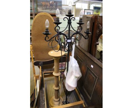 A BLACK FINISHED WROUGHT IRON FREESTANDING FIVE SCONCE LAMP plus shades 