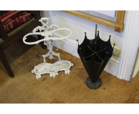 A novelty stick stand in the form of an umbrella together with a white painted Victorian design stick stand decorated with fr