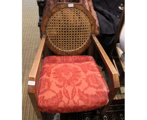 AN ART DECO DESIGN LOW ARMCHAIR with bergere back and overstuffed seat pad 