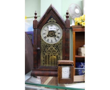 A 19TH CENTURY PROBABLE AMERICAN ROSEWOOD CASED GOTHIC DESIGN MANTEL CLOCK, together with a 19th century cased miniature bras
