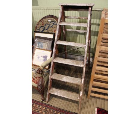 A VINTAGE WOODEN STEPPED FOLDING SIMPLEX LADDER 