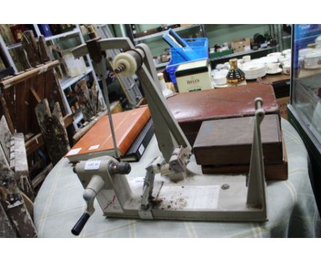 A METAL MANUAL RIBBON WINDER 