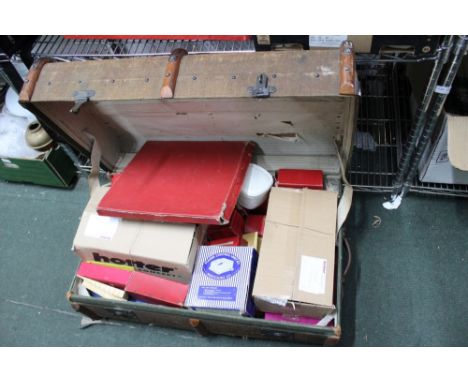 A BEECH STAVED HESSIAN TRAVELLING TRUNK containing an extensive collection of model railway items 