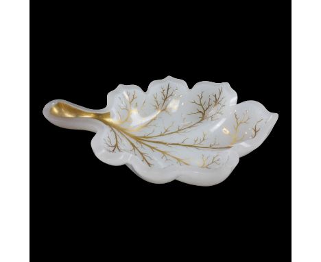 A small 19th Century gilt-enriched milk glass trinket dish in leaf-form, 13 cm x 9 cm x 3 cm