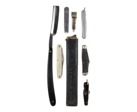 A combination pocket knife together with four other pocket knives, a cutthroat razor and a cigar cutter