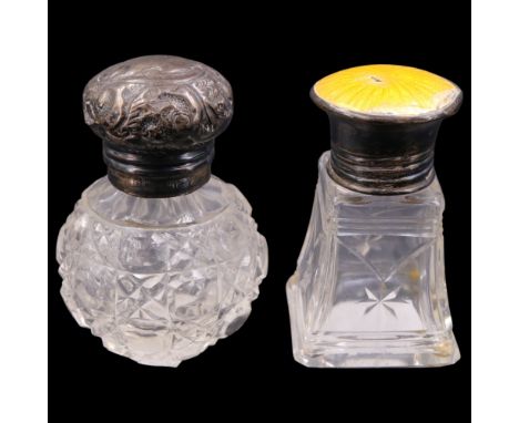 A silver mounted cut glass dress table scent bottle, having a basse taille enamelled rose engine turned cap, together with a 