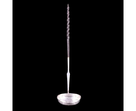 An 18th Century baleen-handled silver punch ladle, un-marked, 36 cm