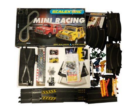 A Scalextric Mini Racing set together with track, accessories, etc
