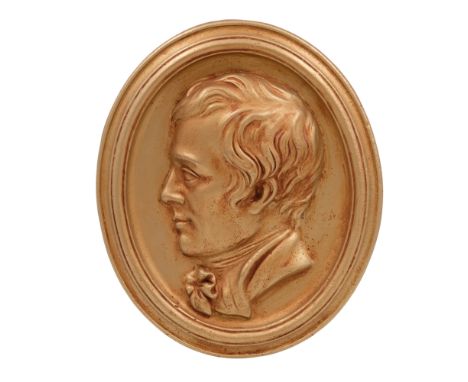 A gilt plaster profile portrait plaque depicting Robert Burns, 39 cm x 33 cm