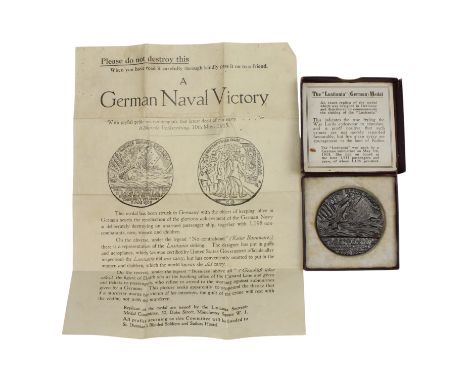 A Lusitania medal in carton with leaflet