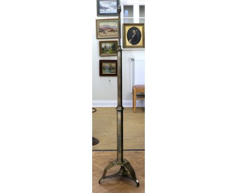 An Art Deco-influenced telescopic brass standard lamp, of sophisticated hand-made flush-rivetted and bolted construction, cir