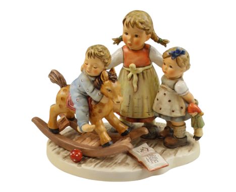 A boxed signed limited edition Goebel Hummel "Learning to Share" figurine, number 1267, 18 cm