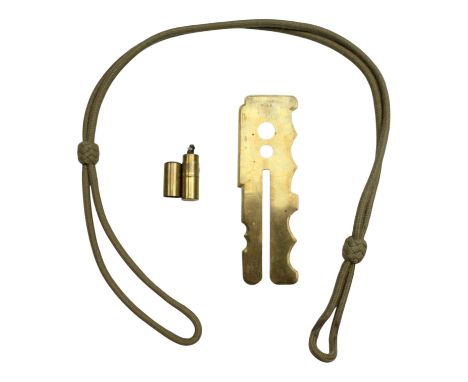 A Second World War Utility lighter together with a Great War button stick and a revolver lanyard