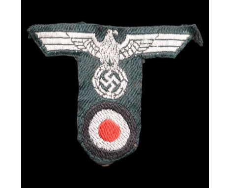 A German Third Reich army Panzer troops machine woven cap badge