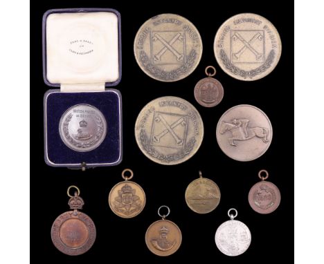 A 1909 "Rifle Meeting South Africa The Army Championship Intercolonial Team Competition" medallion, a 142nd 6th London Infant