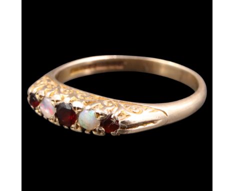A five-stone opal and garnet dress ring comprising three graded round-cut garnets of approx 0.2 ct, divided by two opal caboc