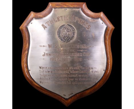 An Edwardian silver Richmond School, Yorkshire, "Athletic Sports" prize shield, engraved to W S Wilkinson, silver on oak, Bir