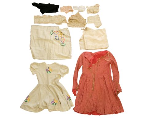Two early 20th Century children's dresses together with a quantity of Victorian and early 20th Century lace collars, a silk s