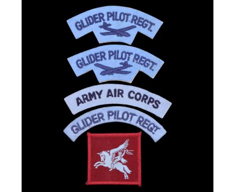 A quantity of post-war British Army Parachute and Glider Pilot Regiment shoulder titles and formation signs