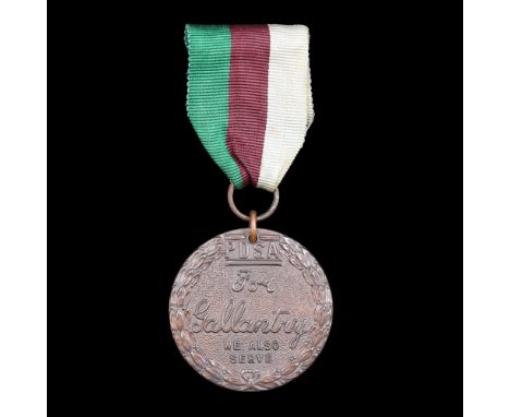 A PDSA Dickin medal awarded to the homing pigeon Tommy for assisting the Dutch Resistance during the Second World War, the me