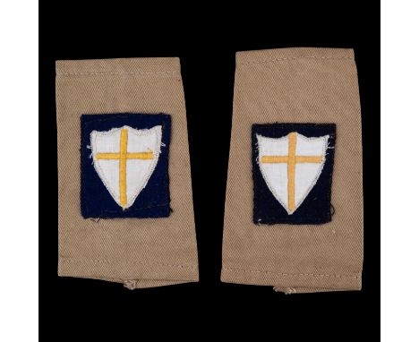 A pair of British 8th Army slip on formation signs