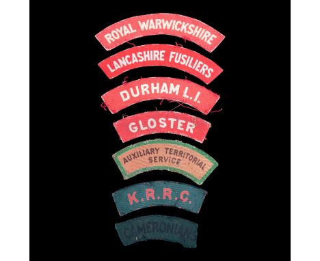 A small group of British Army printed shoulder titles