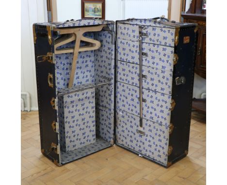 A vintage "The Orderlee" wardrobe trunk, with key, 54 cm x 55 cm x 105 cm 