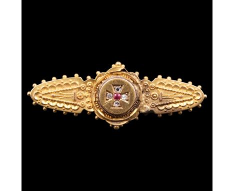 A Victorian ruby, white sapphire and 15 ct gold plaque brooch, centred by a cross grain-set with five old-cut stones on a cir