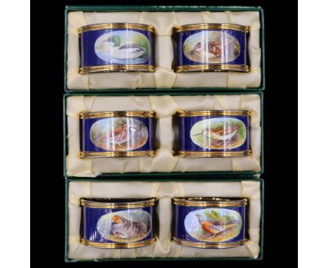 Three pairs of boxed Graham Payne Studios "English Enamels" hand-painted napkin rings, decorated in depiction of British game
