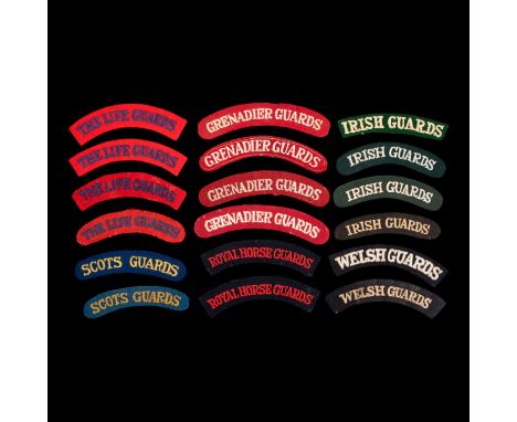 A group of various British Army Guards shoulder titles