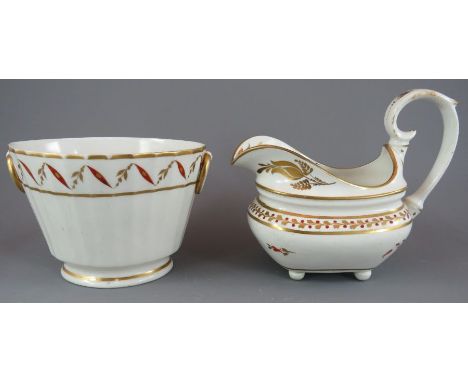 An early nineteenth century hand-painted Derby porcelain footed creamer and sugar box with ring handles, c. 1800-1820. Both m
