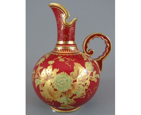 A late nineteenth century Derby porcelain raised gilding jug, c. 1890.  It is decorated with flowers on a red ground. Marked 