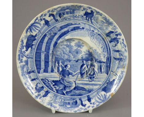 An early nineteenth century blue and white transfer-printed Spode Caramanian series broth pot stand, c. 1815. It is marked to