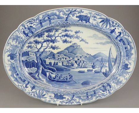 An early nineteenth century blue and white transfer-printed Spode Caramanian series platter, c. 1810. It is printed with a vi