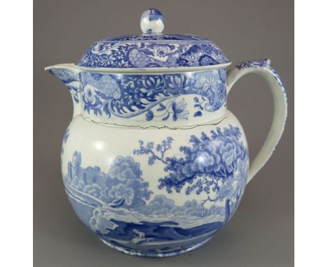 An early nineteenth century blue and white transfer-printed Spode Italian pattern toast water jug, c. 1820. It is marked to t