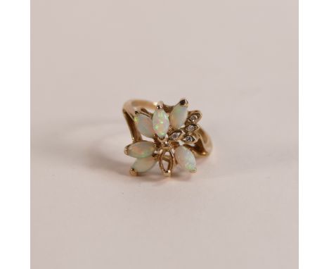 9ct gold flower ring set with diamonds and opals, one opal stone missing, 3.3g.