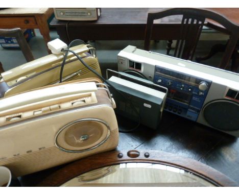 Four vintage radios to include a Triumph RR3010, two Bush and a PYE with an oval mirror, two Davenport Bates prints of ladies